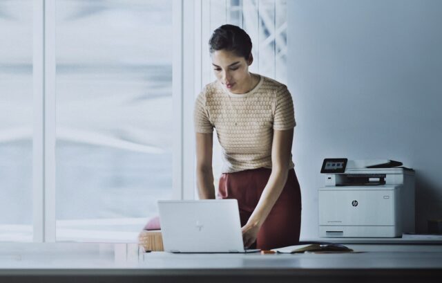 person using a laptop and is thinking about printer endpoint security